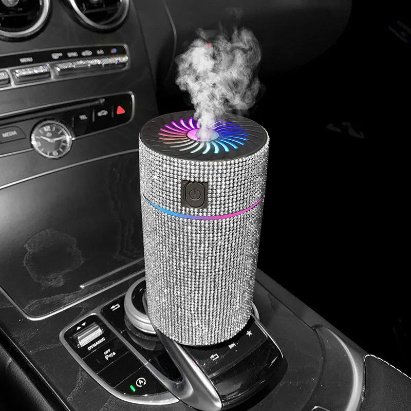 Compact car-mounted air purification humidifier unit on vehicle dashboard with USB power cord