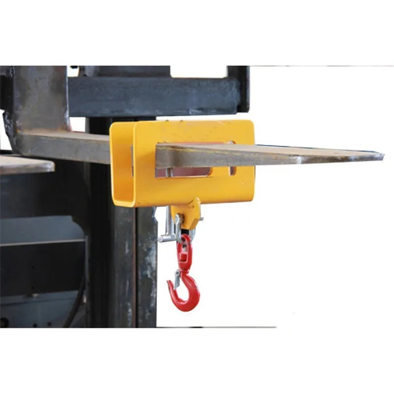Iron forklift crane hook with rotatable head and safety lock mounted on forklift forks.