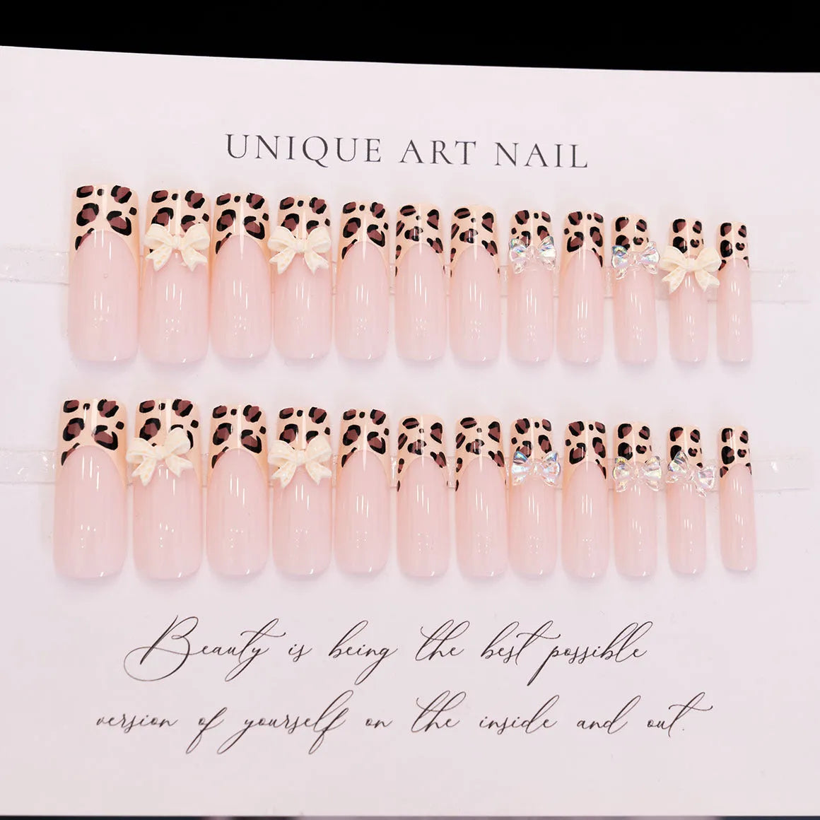 Leopard print false nails with butterfly decorations in colour WM296