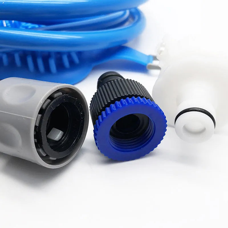 Blue pet bath brush with 2.5-metre hose, silicone and ABS body, and two adapters for dogs and cats