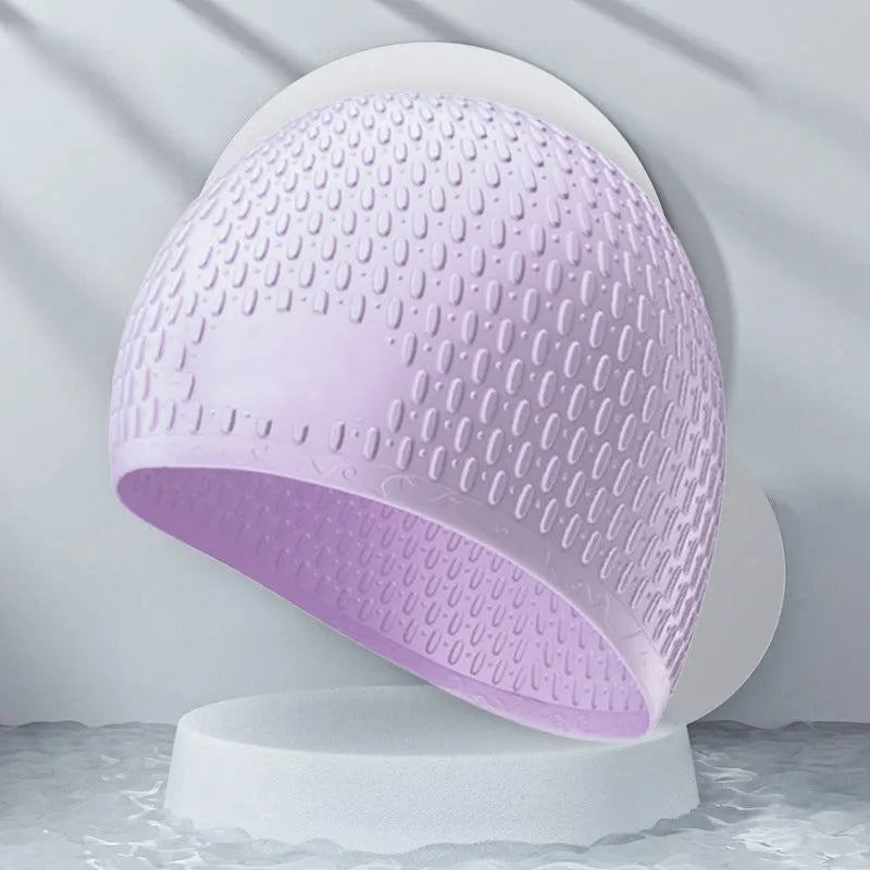 Adult solid colour silicone swimming cap with water drop design shown in multiple colour options.