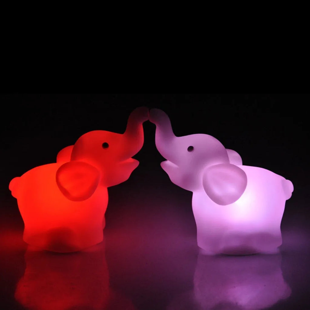 Elephant night light, vinyl, 8x8.8x4.5cm, with 7 colour changing slow flashing battery-powered light