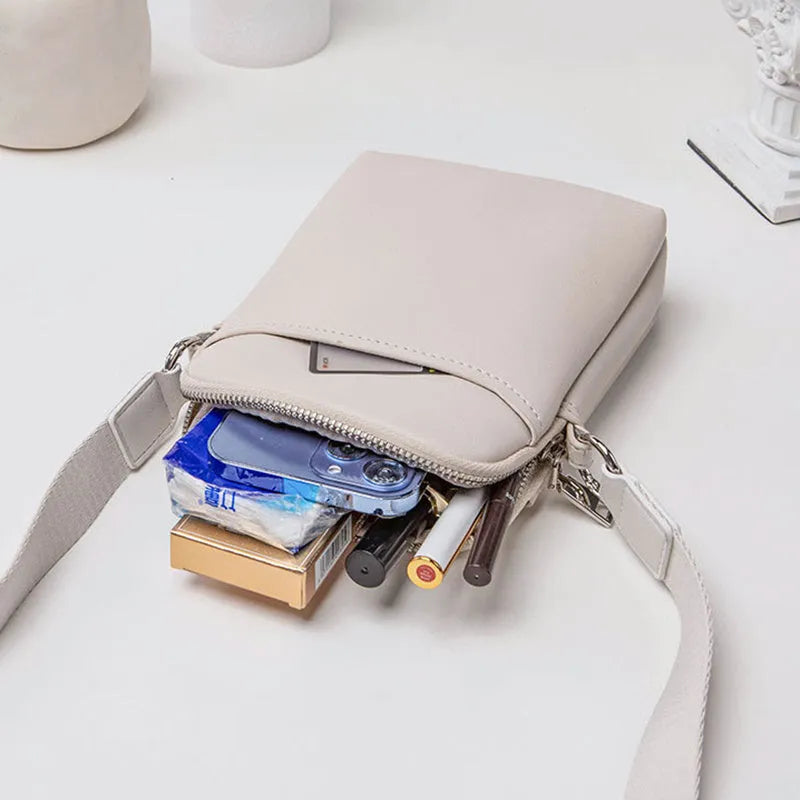 Solid colour mobile phone crossbody shoulder bag for women in PU material showing black, beige, khaki, and green colour options