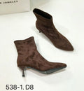 Black pointed toe women's ankle boots with a stiletto heel on a white background.