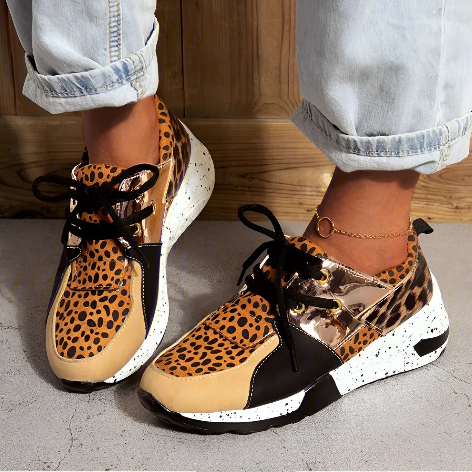 Women's suede flat sneakers with a wedge heel in black, leopard, pink, panther, and snake pattern colour options