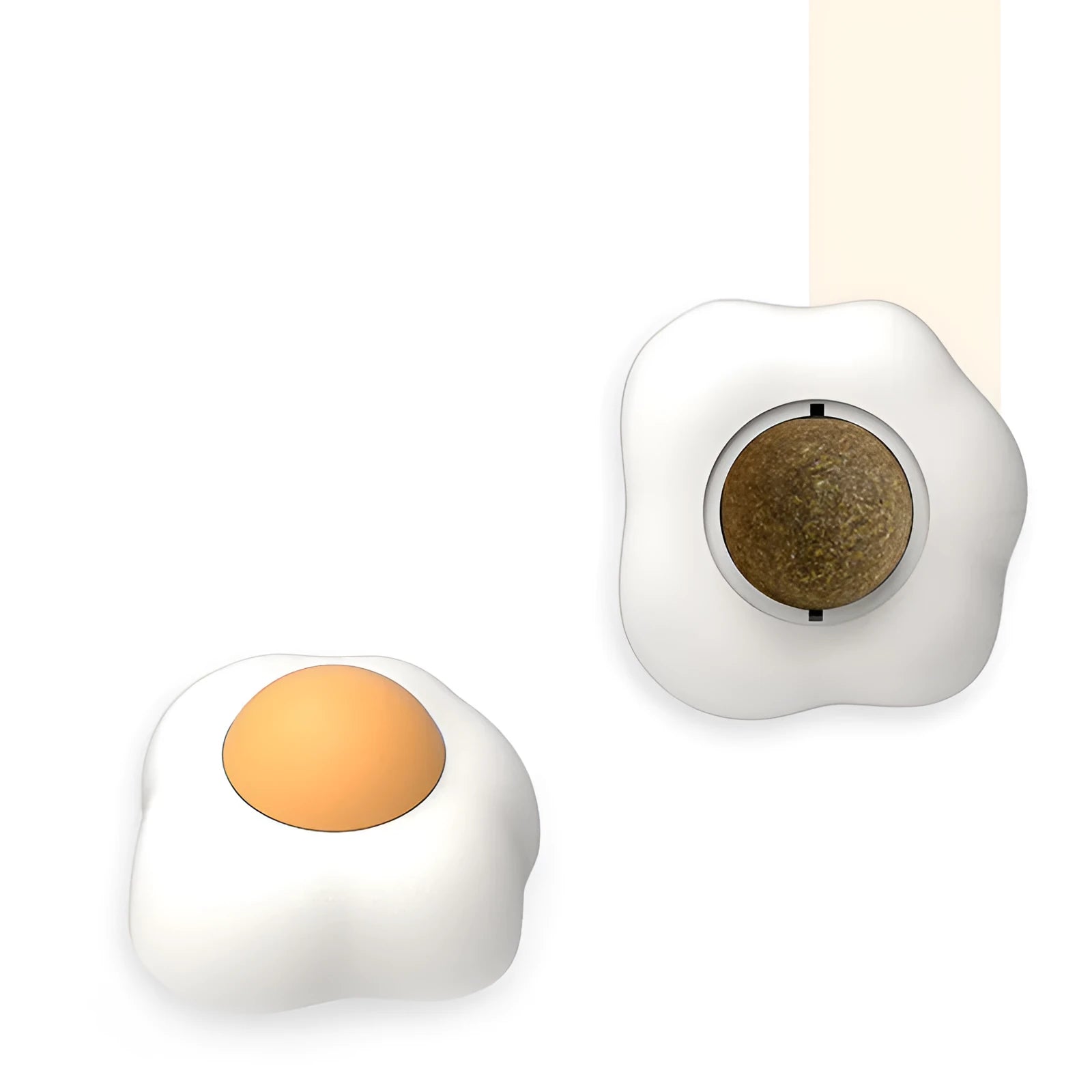 Catnip ball toy in fried egg and poached egg shapes with adhesive backing for wall and floor play