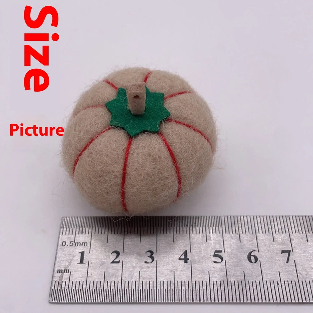 Wool felt pumpkin ornaments for doll displays in autumn colours