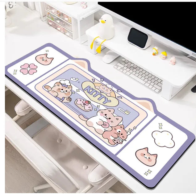 Oversized natural rubber desk pad mouse mat in Pink Bunny design showing 50x100cm size on office desk