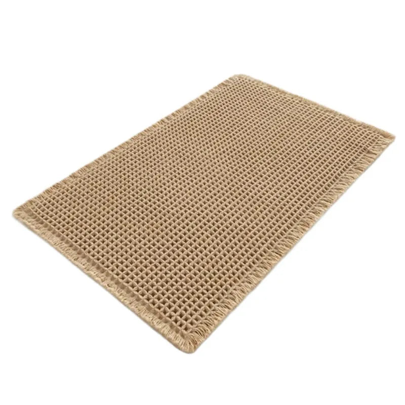 Checkered pattern non-slip absorbent bathroom carpet on a tiled floor.