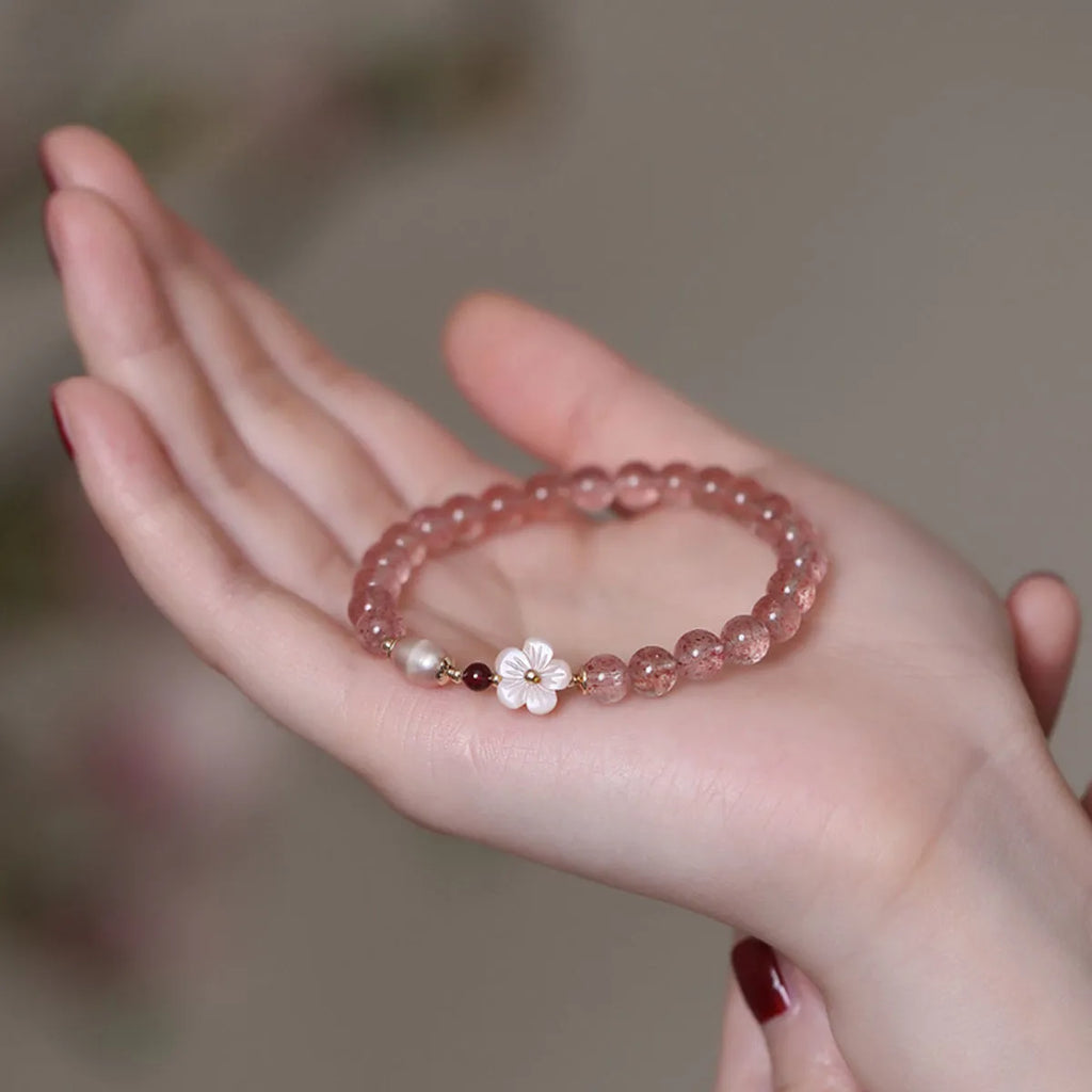 Women's strawberry quartz crystal floral bracelet with adjustable silver-tone chain