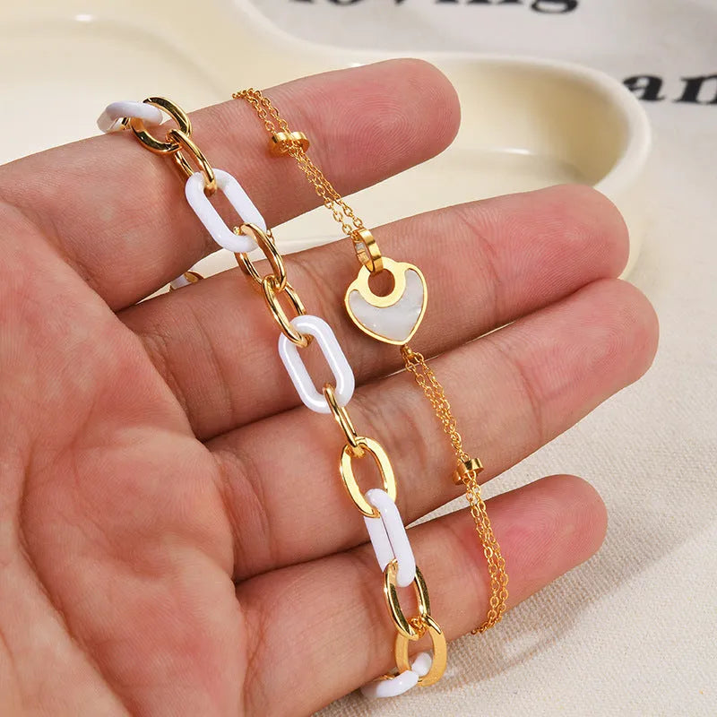 Women's stainless steel resin bracelet with double-layer heart design and electroplated finish