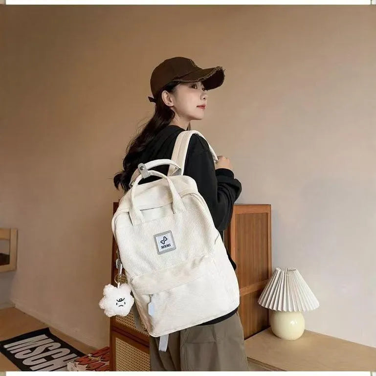 Retro hand-carrying backpack for junior high school with document bag, computer pocket, and sewing-line detail