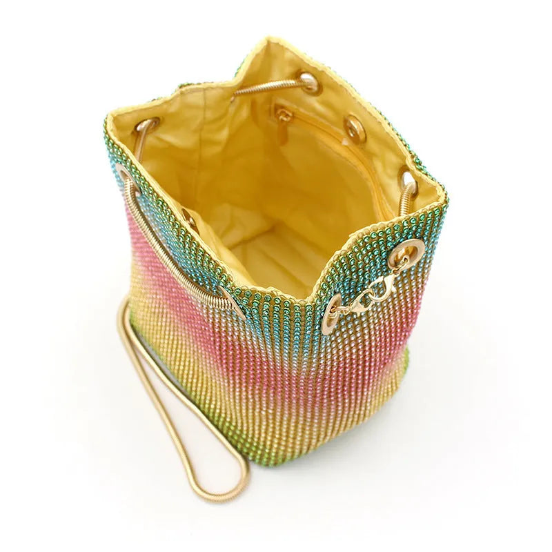 Rainbow coloured rhinestone bucket bag with sparkling diamond decoration