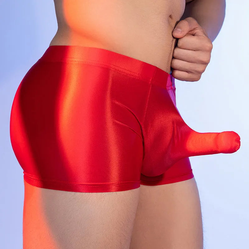 Men's seamless nylon boxer shorts in black, shown with mid-waist and hip-lift design.