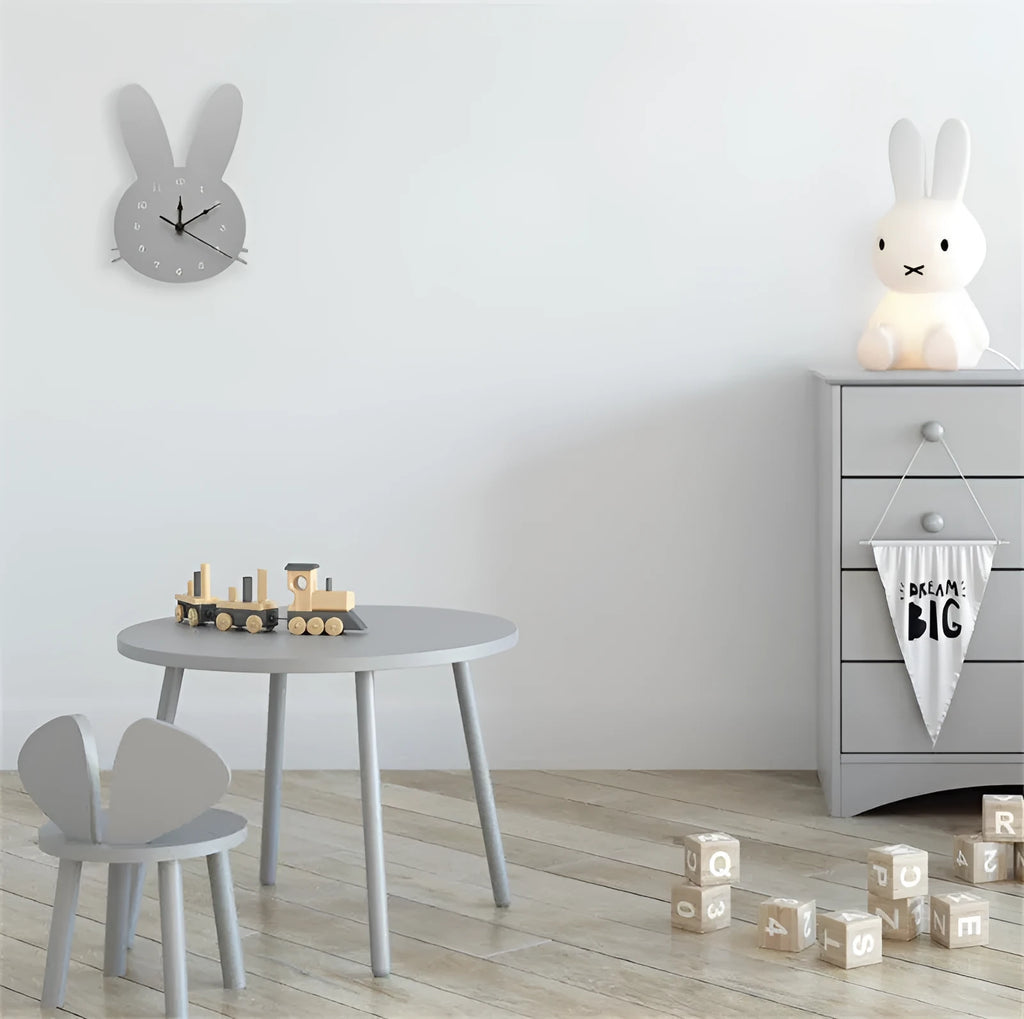 Cartoon wooden wall clock with alien and animal designs in multiple colours