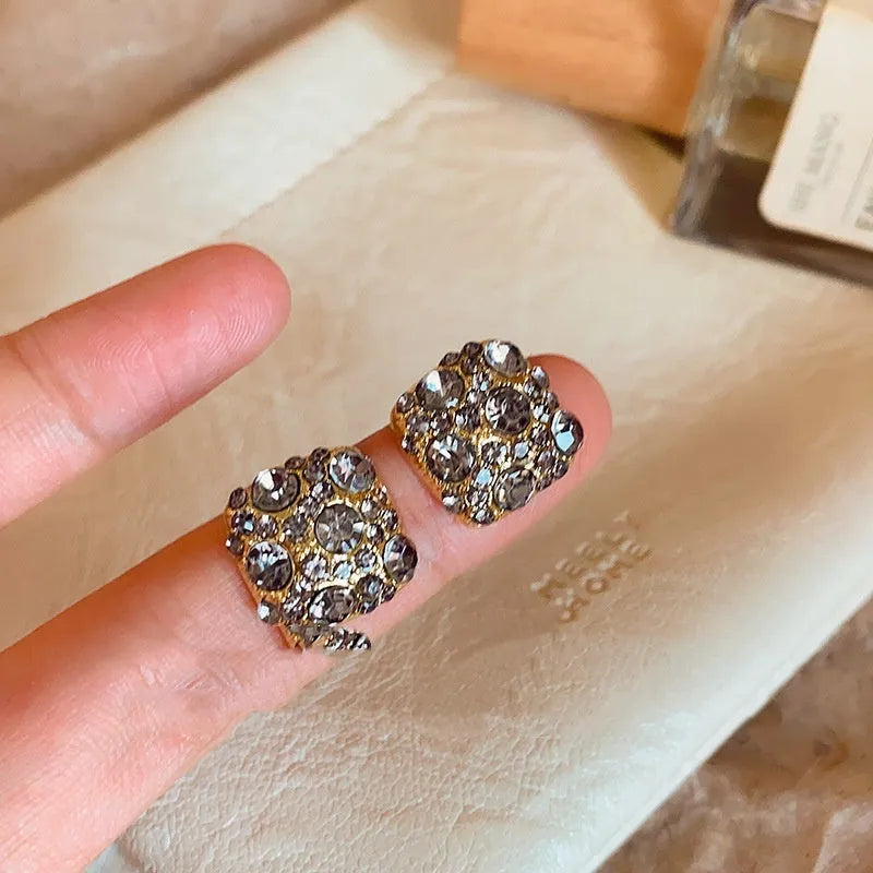 Gold tone alloy square earrings with black micro inlaid zircon and chamfered square grain for women
