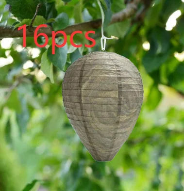 Hexagonal beehive lantern with paper and wire construction measuring 22cm by 28cm