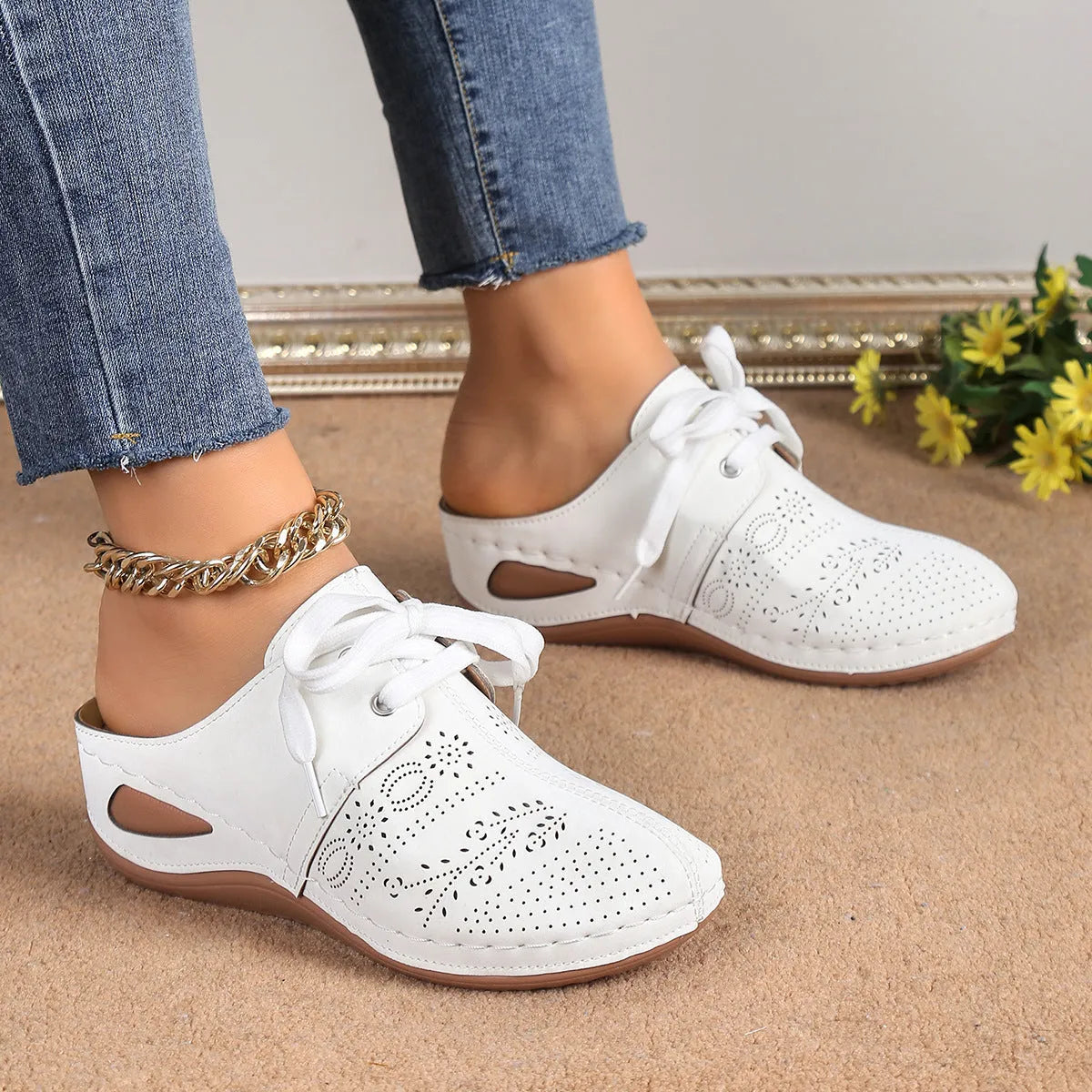 Women's lace-up summer slippers with suede upper, wedge heel, and rubber sole in various colours.