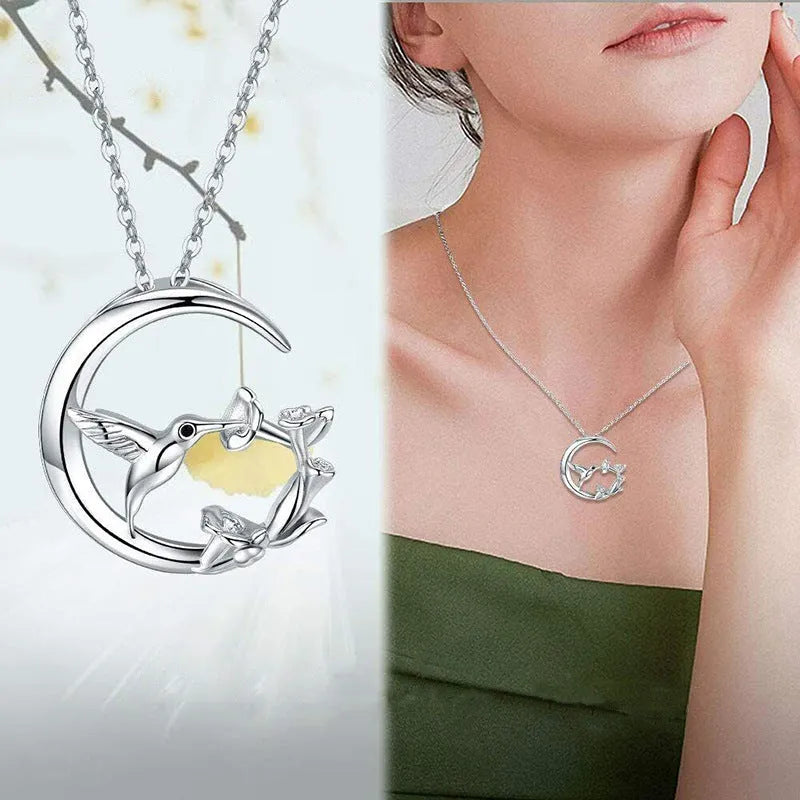 Copper necklace with morning glory blossom and hummingbird pendant in platinum tone on an O-link chain