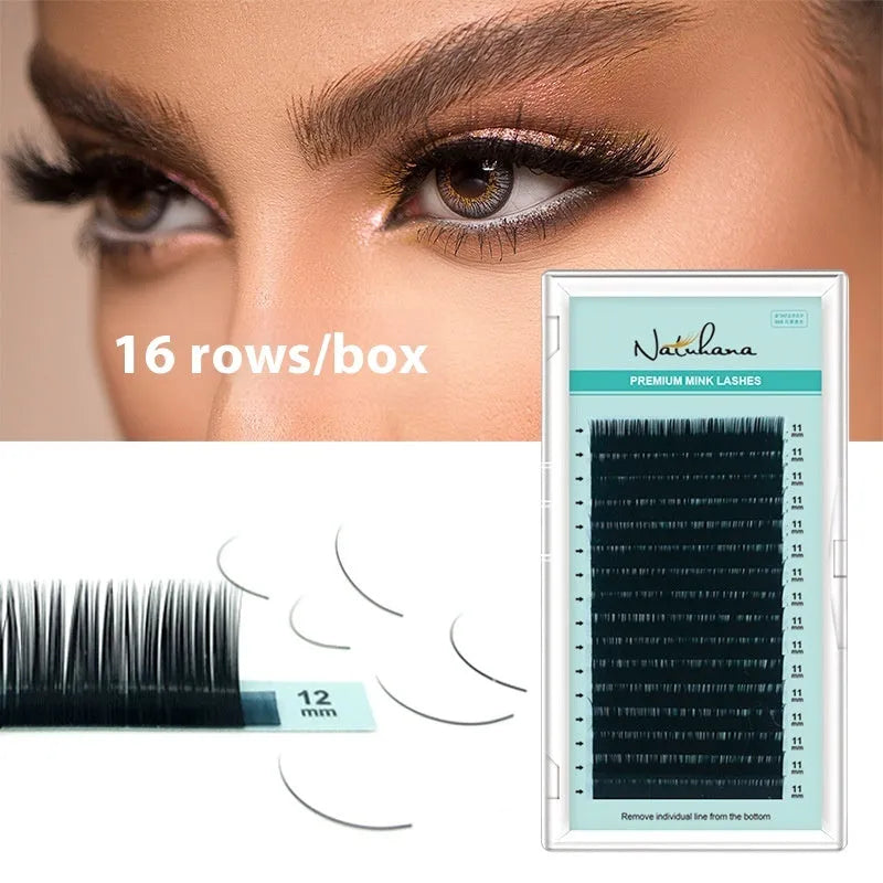 Black artificial fibre false eyelashes showing different length and density options on a clear tray