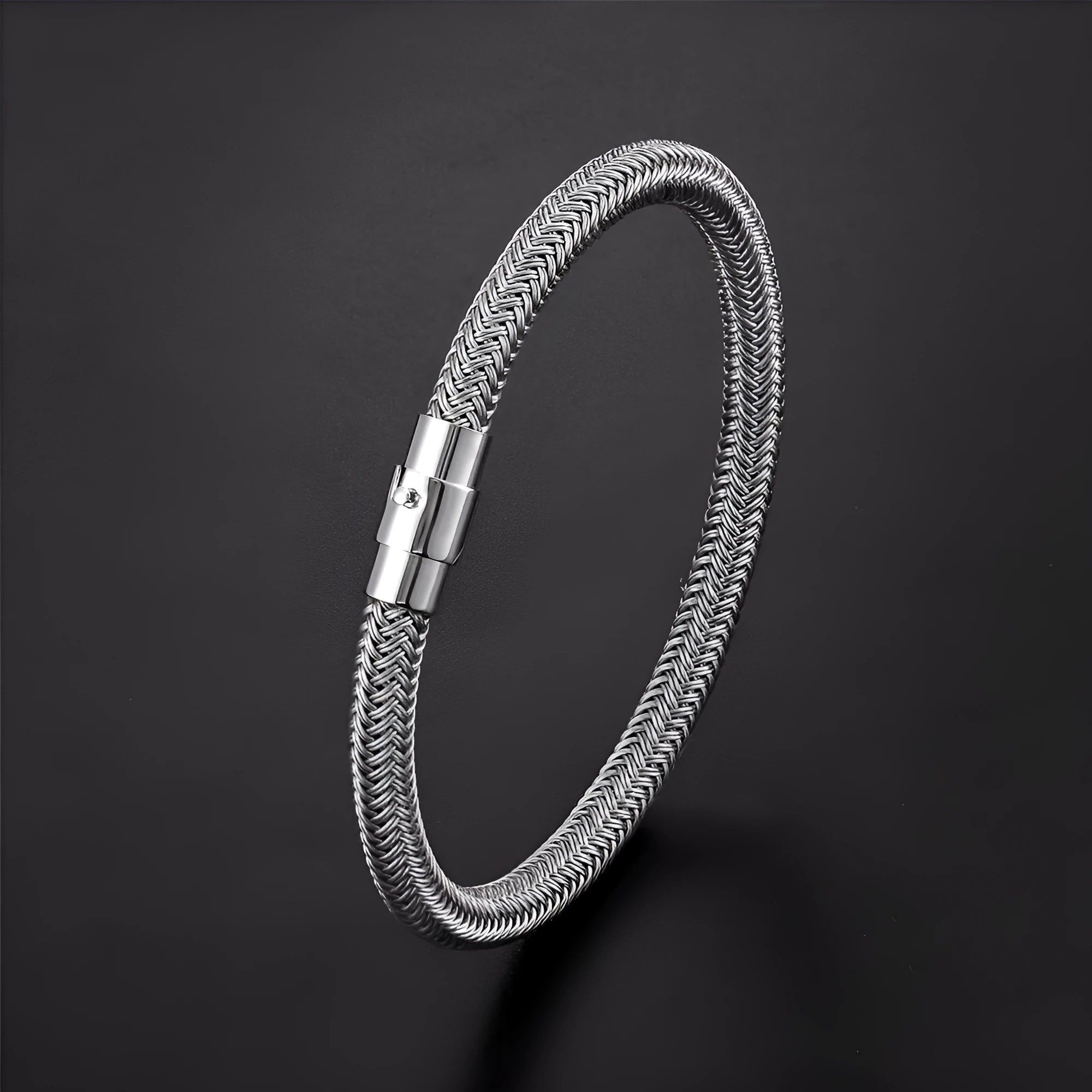 Geometric titanium steel wire bracelet with magnetic closure in silver tone