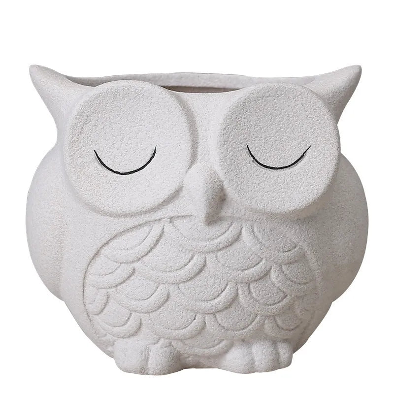 Handmade frosted ceramic flower pot with a cartoon owl design for succulents.