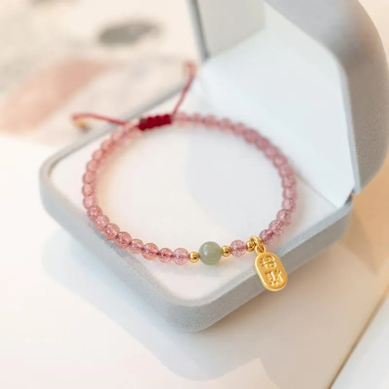Red rope bracelet with strawberry quartz and garnet beads in hand-woven women's design