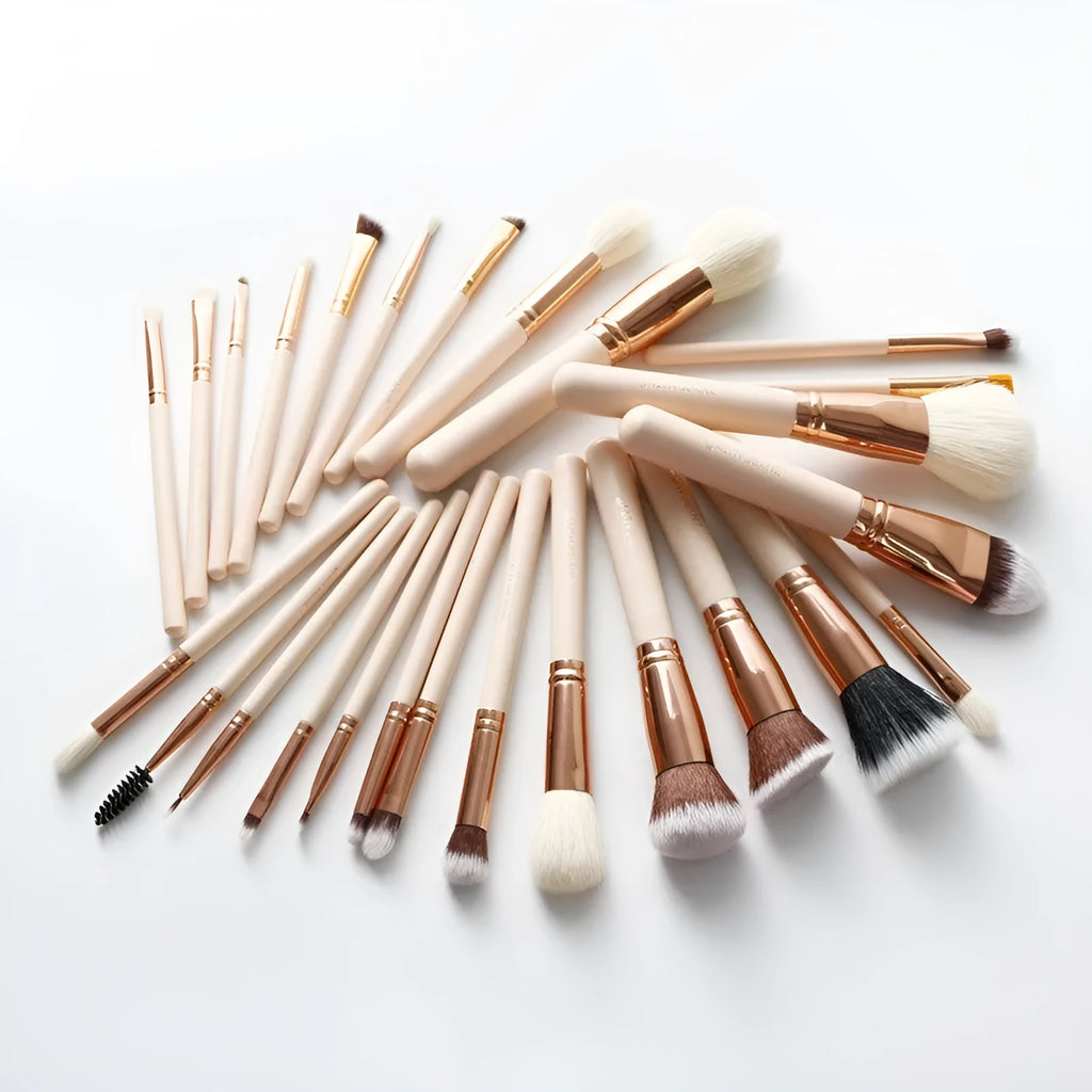 26 pink makeup brushes with wool bristles and wooden handles in storage bag