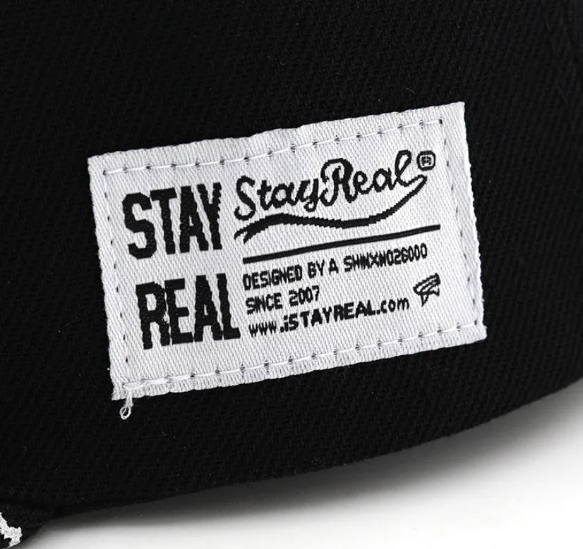 Cotton baseball cap with letter embroidery in black or white with adjustable strap