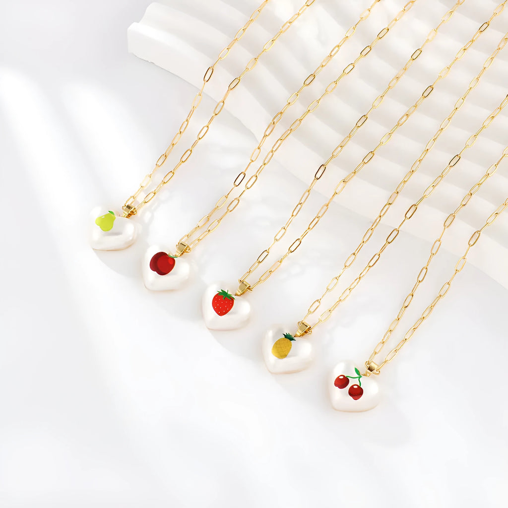 Girl's adjustable necklace with a heart and geometric fruit charms on a chain