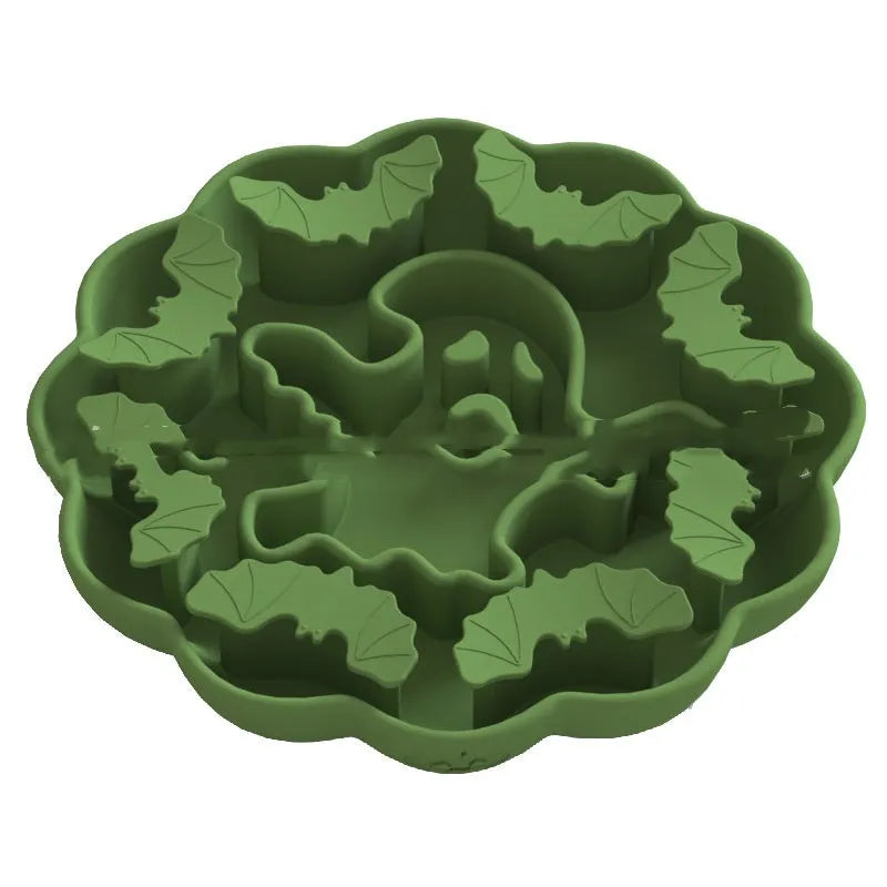 Edible silicon anti-choke slow feeding dog bowl in Halloween orange colour on floor