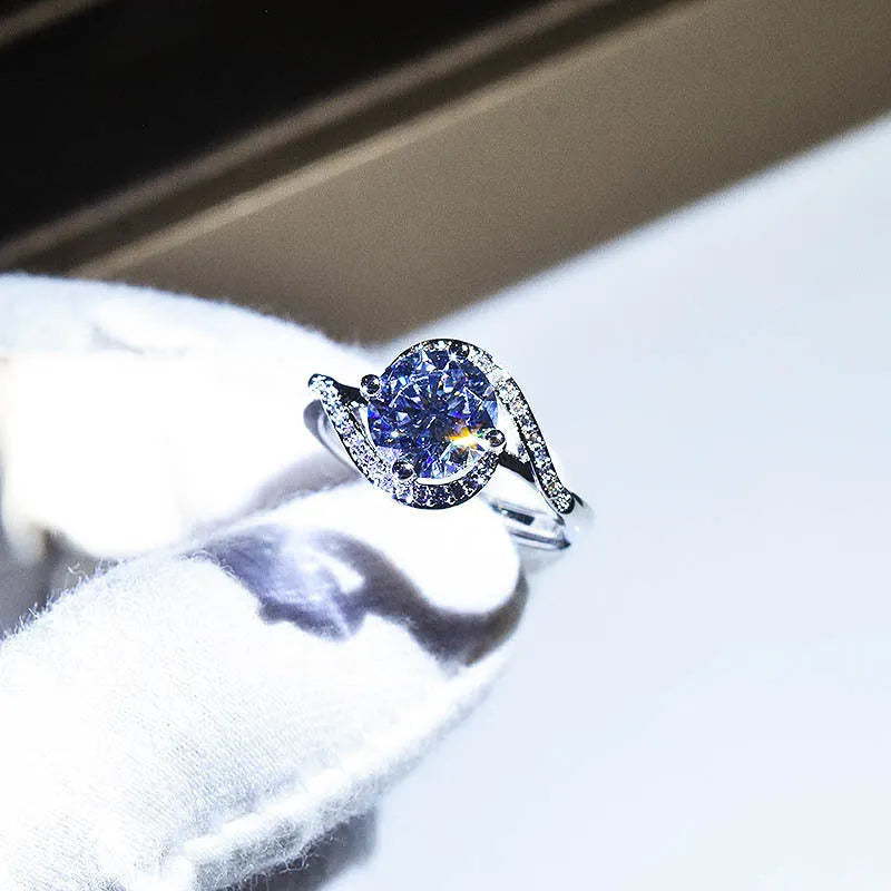 Silver geometric synthetic moissanite ring with adjustable opening showing 8mm stone