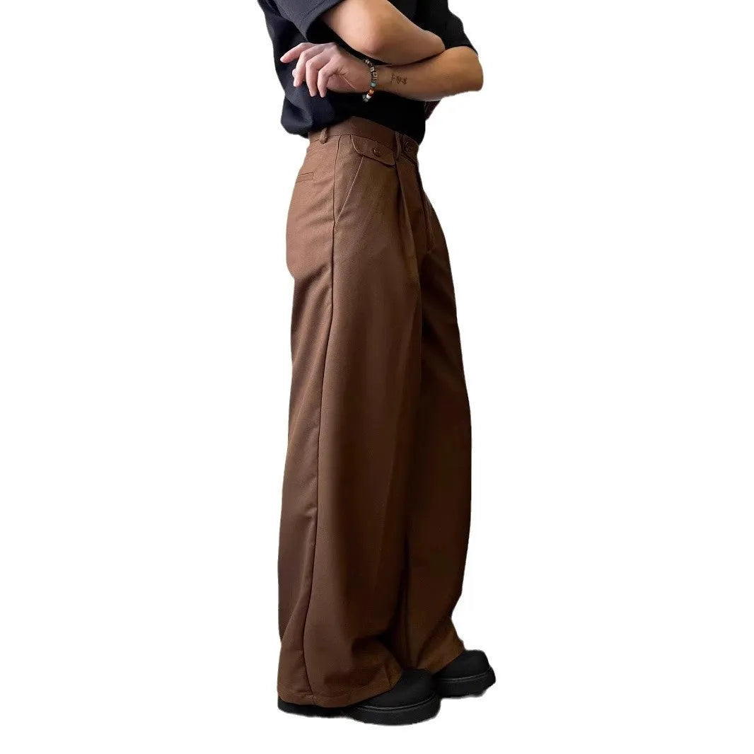Men's brown straight-leg wide drape casual trousers laid flat