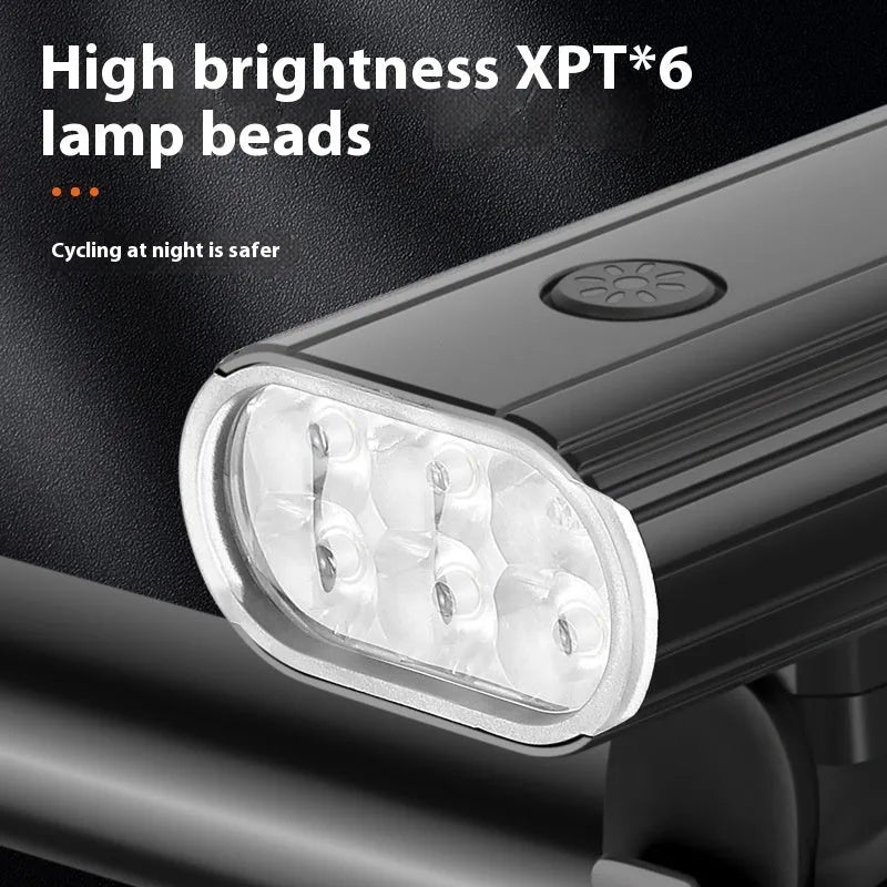 Silver aluminium bicycle headlight showing six XPT lamp beads with USB-C port and quick release mounting brackets