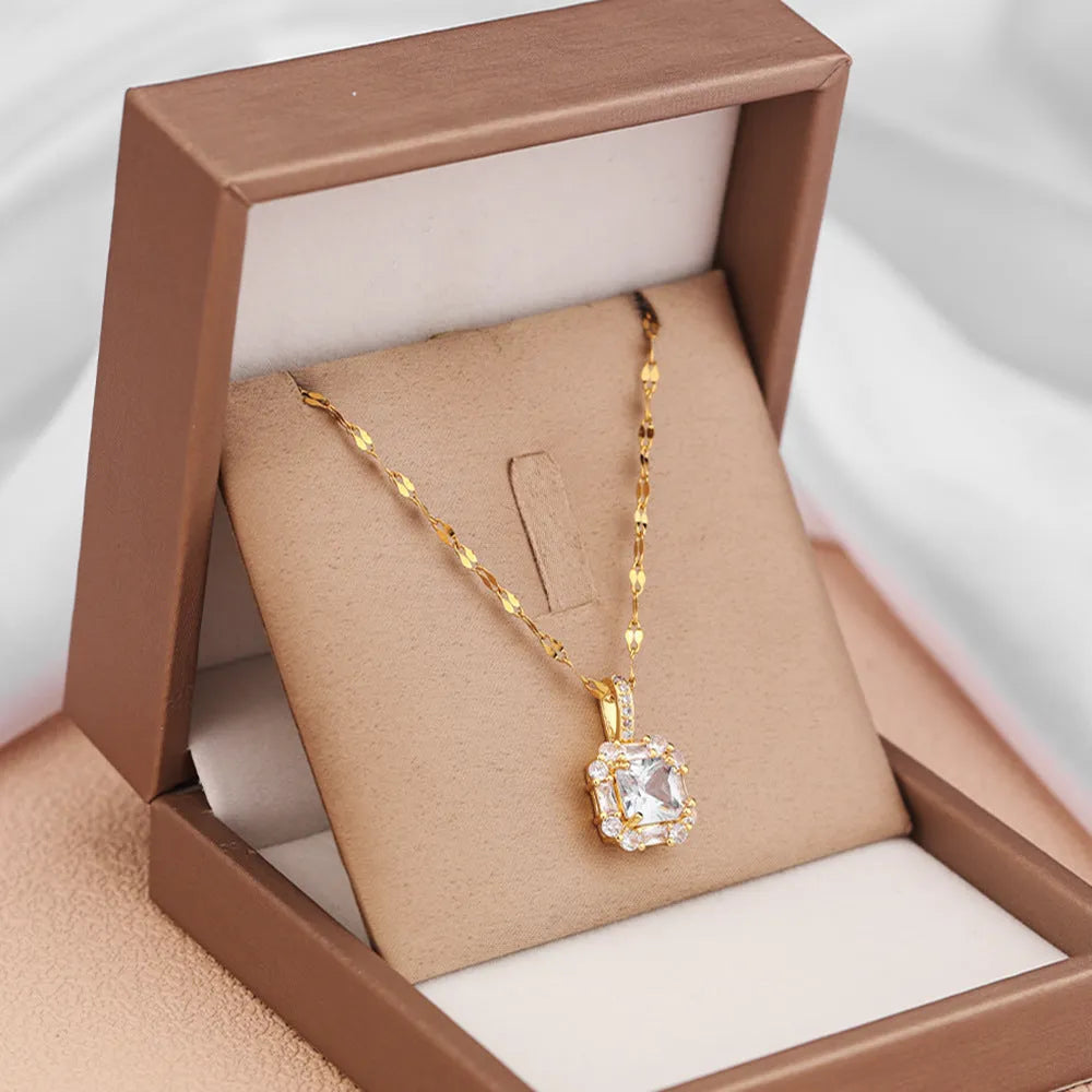 Women's titanium steel clavicle chain with quadrilateral geometric pendant featuring mixed gem inlaid detailing on water wave chain