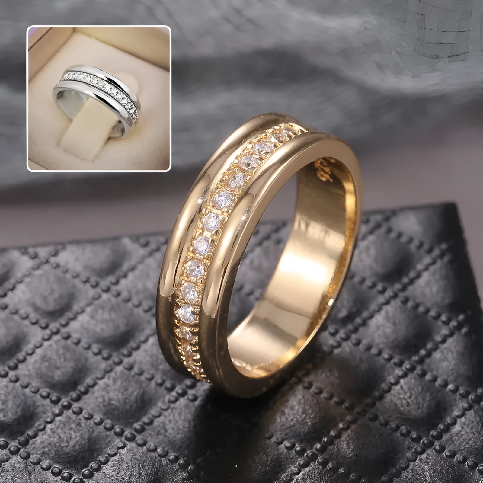 Gold plated copper geometric ring with inlaid zircon stone on white background