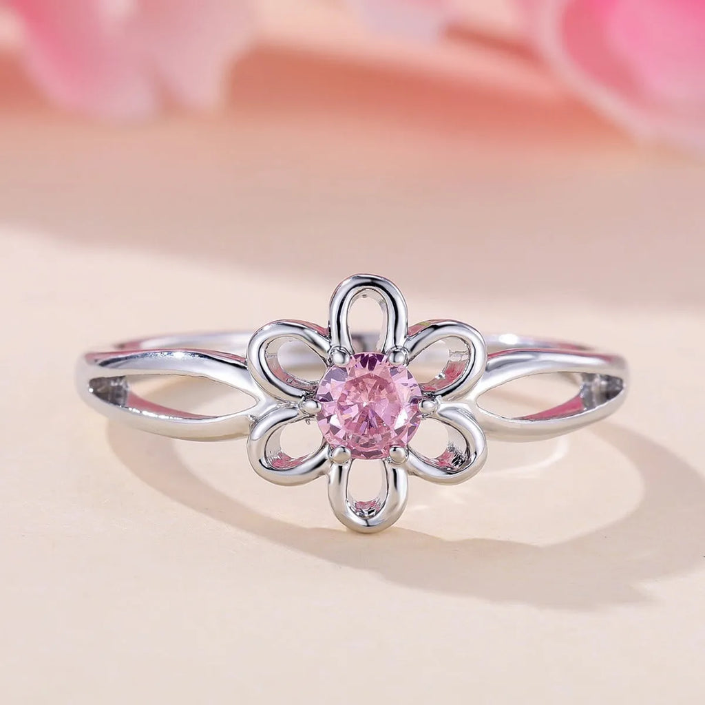 Copper fashion ring with hollowed flower design in platinum pink diamond colour