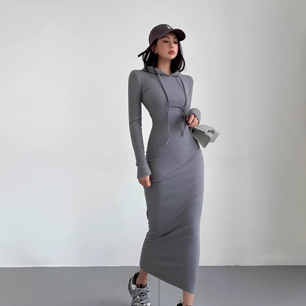 A woman's long sleeve hooded sheath dress in polyester, showing the high waist and over-the-knee length.