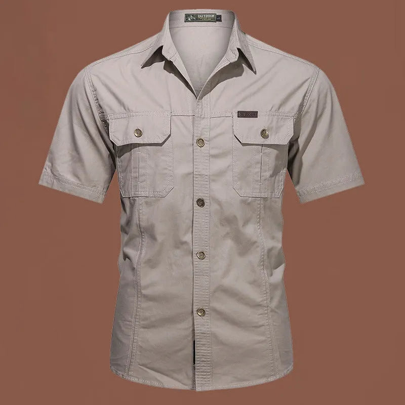 Men's loose-fit short sleeve cotton shirt in army green, laid flat showing cardigan style and non-iron fabric.
