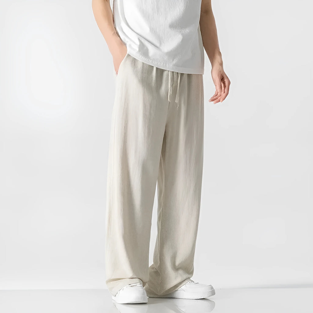 Men's linen trousers in straight-leg cut with cropped length and drawstring waist in beige colour