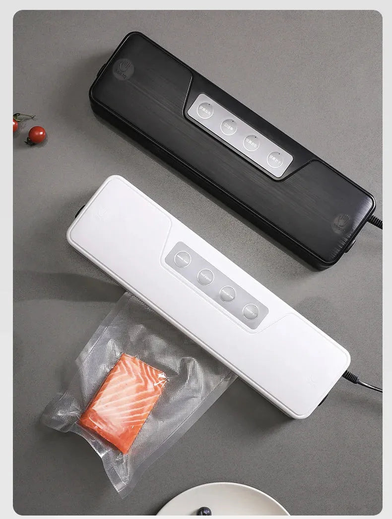 Small white automatic vacuum sealer machine for household food preservation and item protection