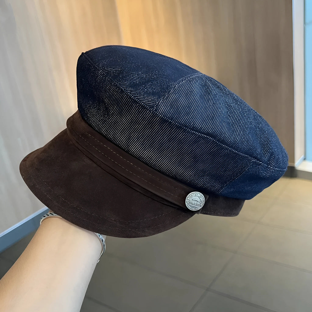 Dark blue denim newsboy hat with octagonal crown and contrasting brim