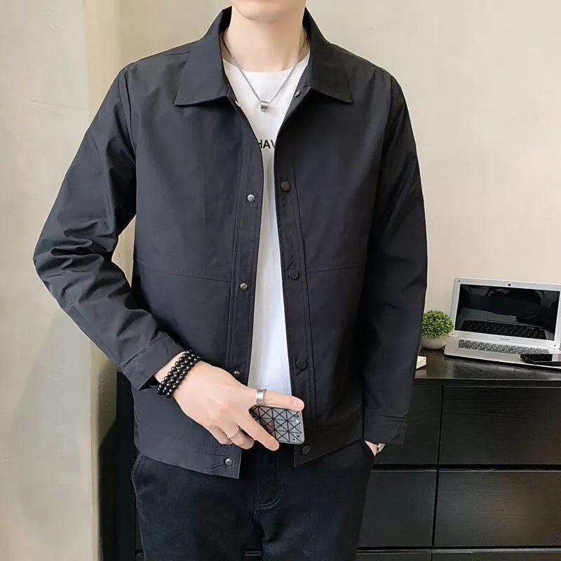 Men's Korean style single-layer thin jacket in grey, showing long sleeves and stitching detail