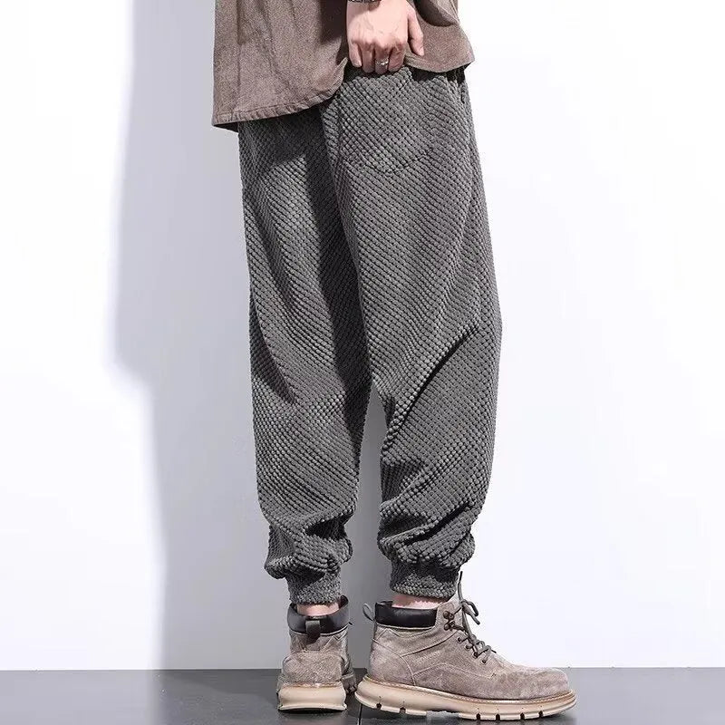 Men's grey casual sweatpants with ankle tie design and straight leg cut