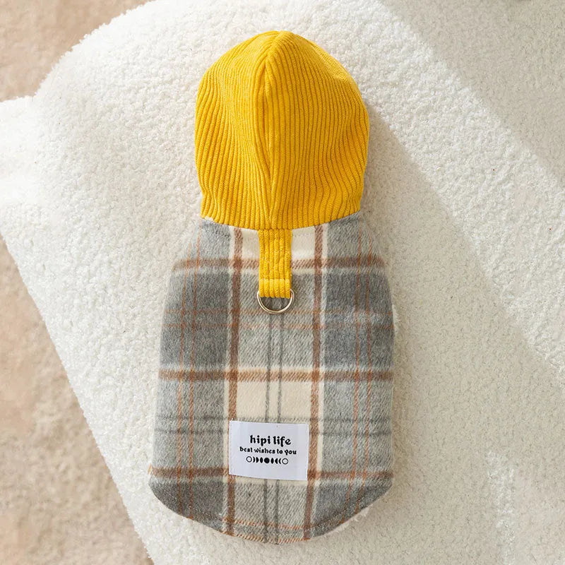 Blue corduroy dog vest with chessboard grid pattern and adjustable hood for winter wear