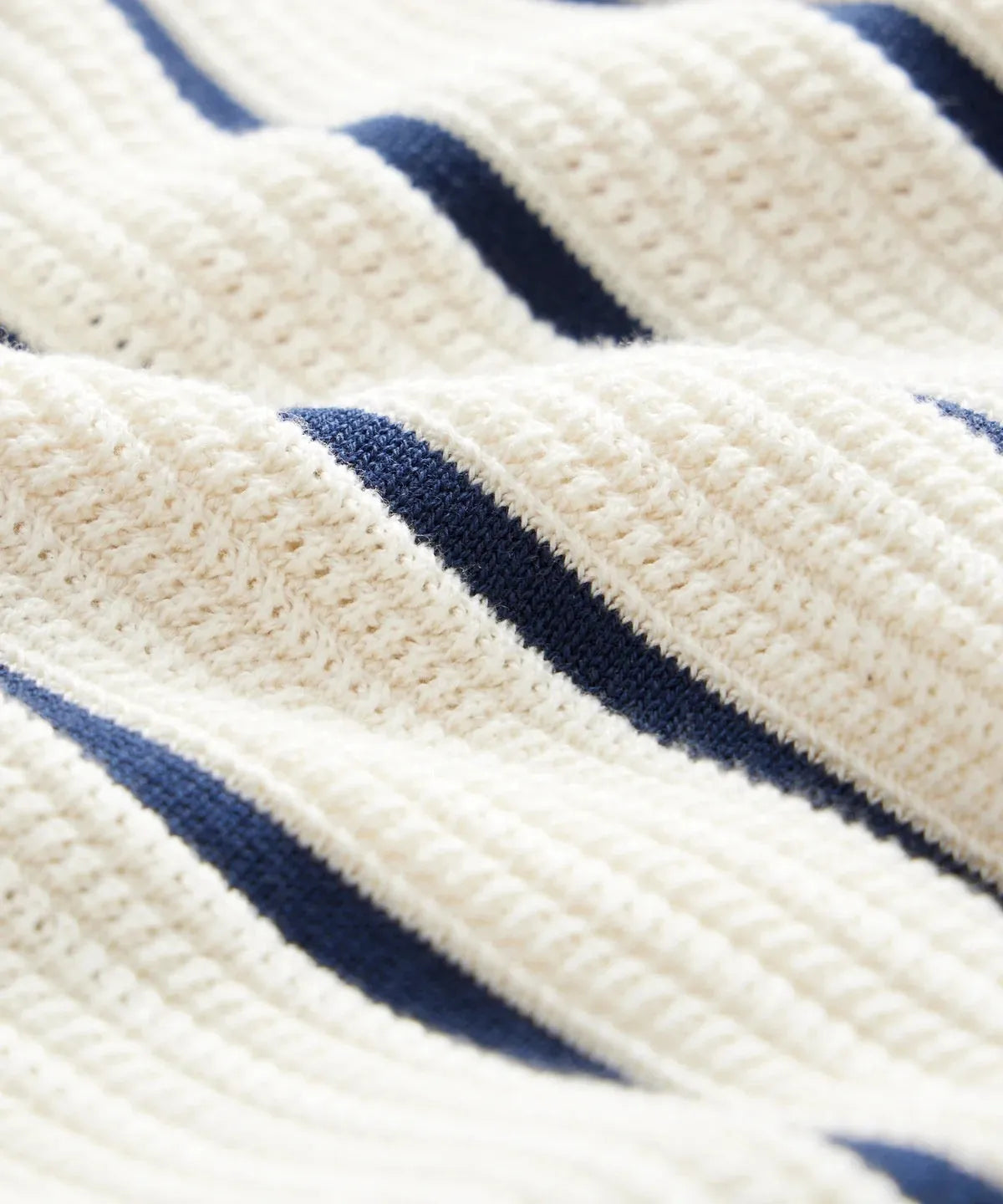 Men's white asymmetric knitted top with short sleeves and lapel neckline in British style