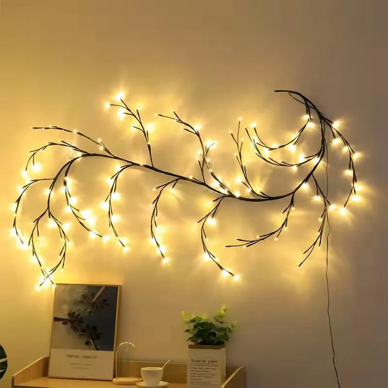 Flexible DIY LED willow vine garland light with warm white LEDs bent into a decorative shape.