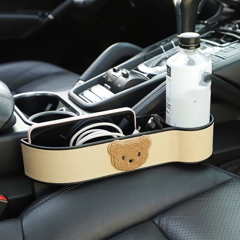 Leather car seat gap storage box with cartoon bear design in black and rice bear colours.