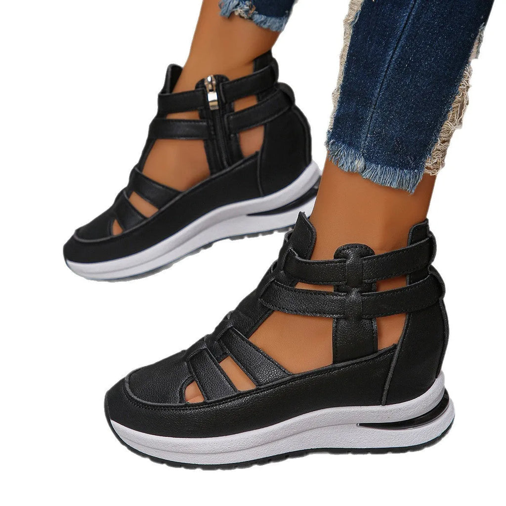Women's black hollow-out platform sandals with a Velcro strap and round toe.