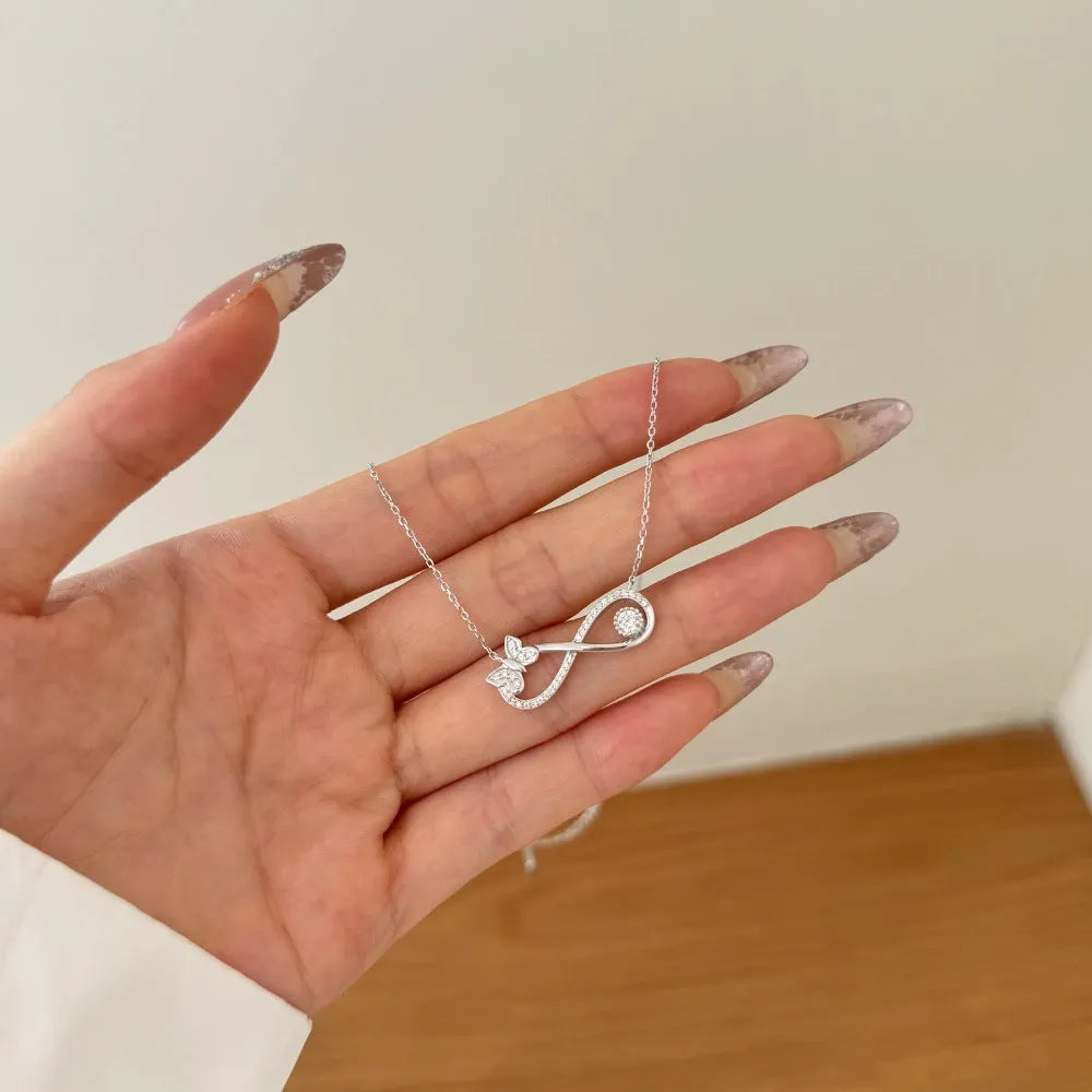 925 sterling silver Mobius bow zircon clavicle chain in gold or platinum finish with butterfly detail